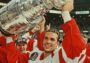 Steve Yzerman raising the Stanley Cup trophy